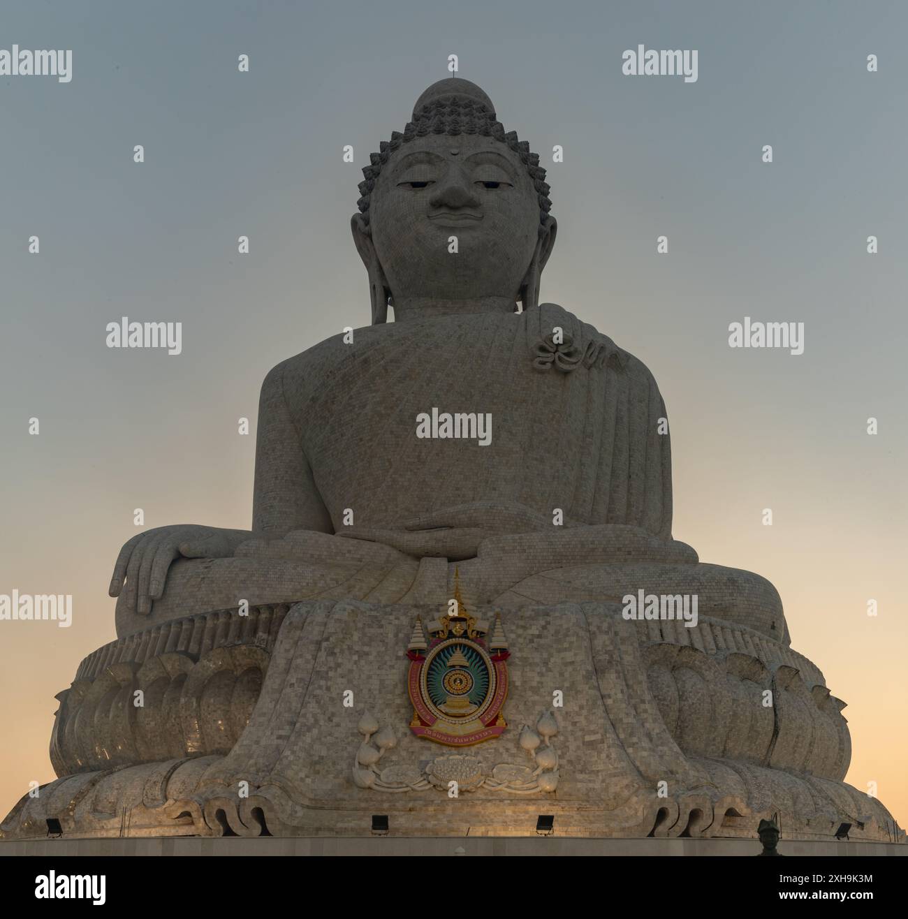A picture of the large Phuket Big Buddha statue, at sunset Stock Photo ...