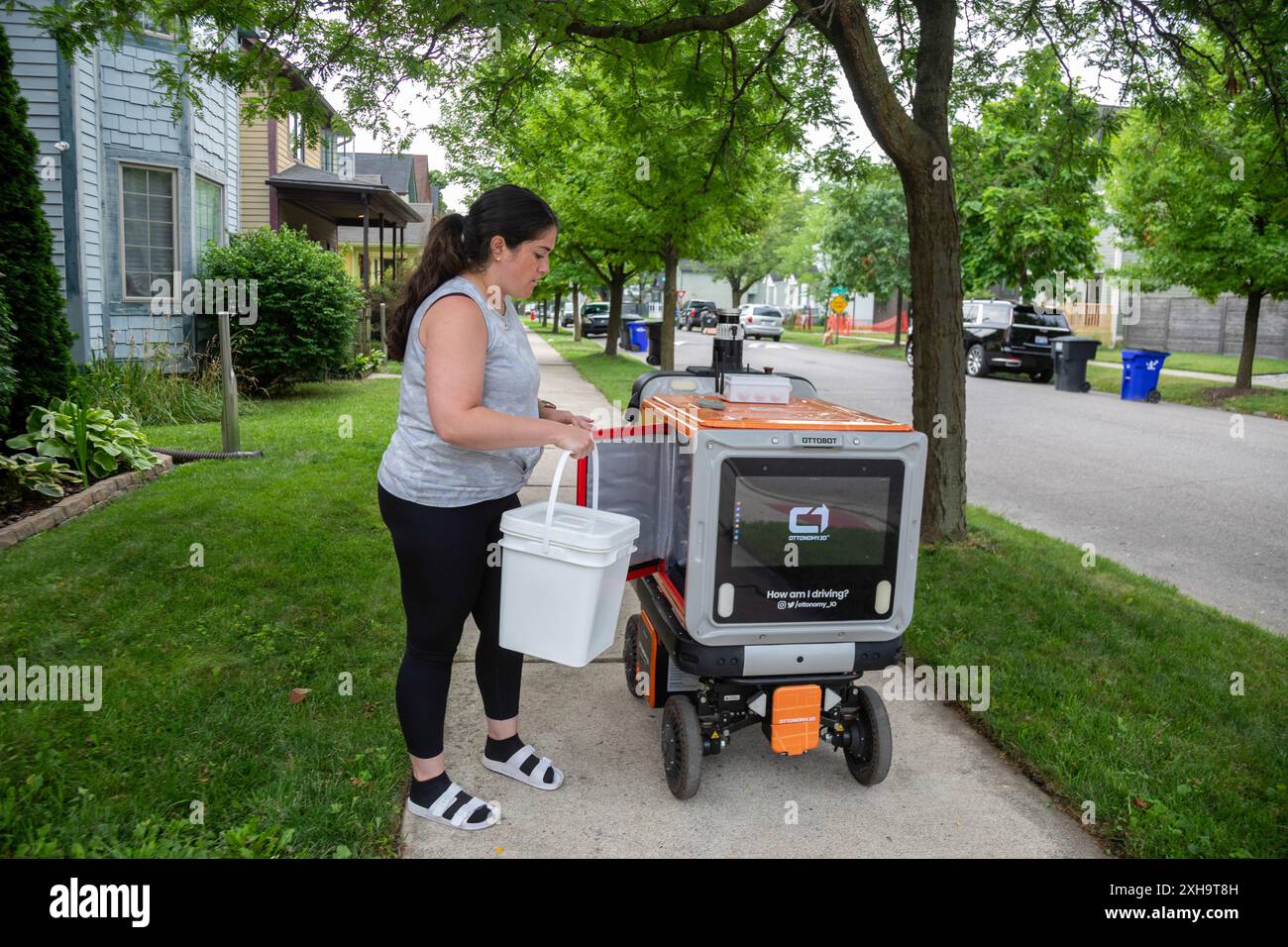 Detroit, Michigan - An experimental, autonomous robot travels the streets of Detroit's Corktown neighborhood, picking up food waste which it delivers Stock Photo