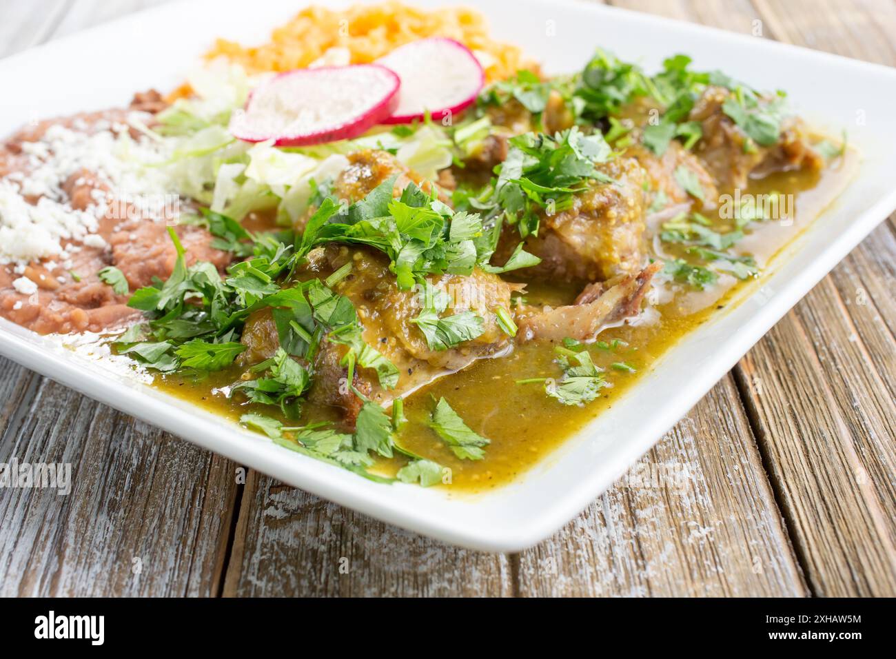 A view of a plate of chile verde. Stock Photo