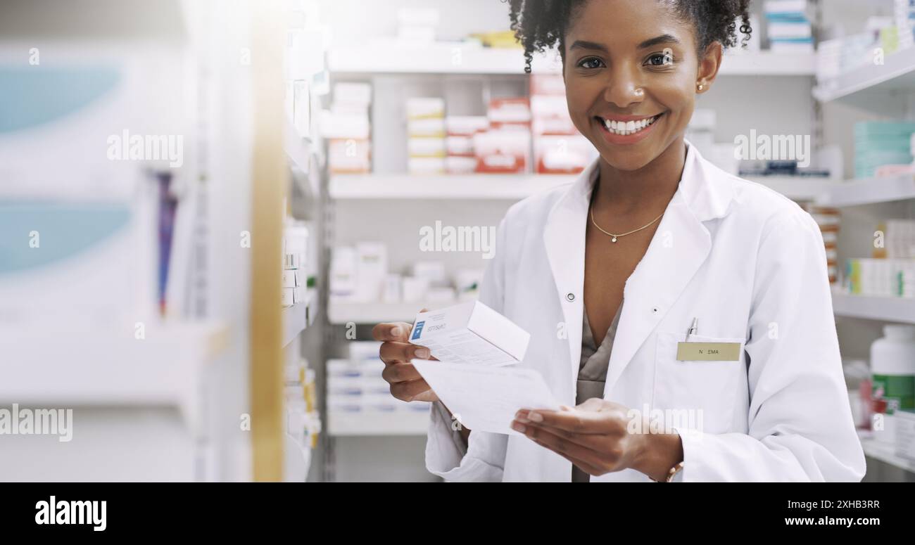 Positive young female pharmacist hi-res stock photography and images ...