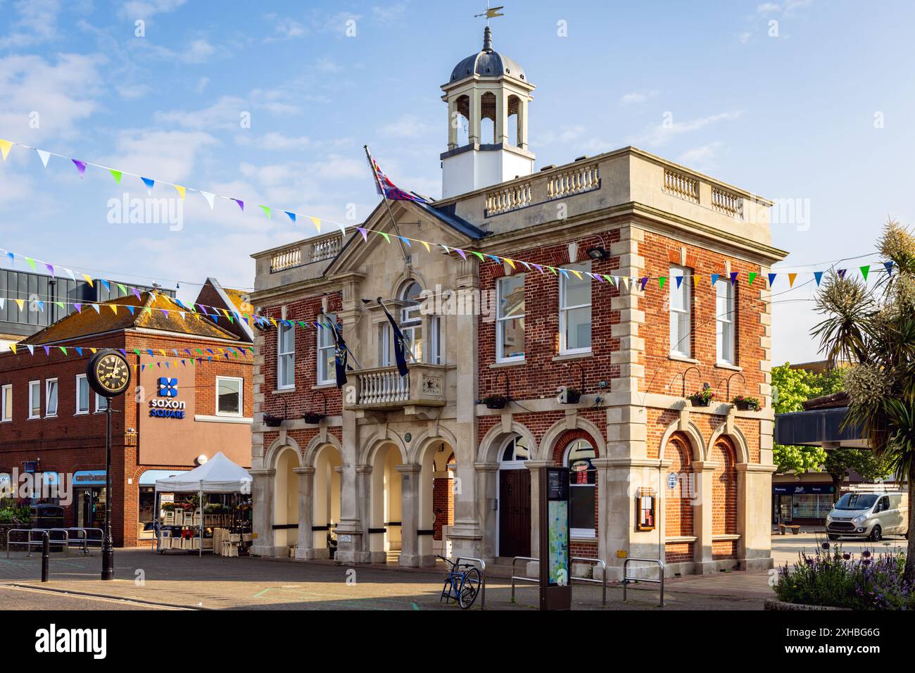The old Town Hall and clock on the High Street in Christchurch, Dorset, UK Stock Photo