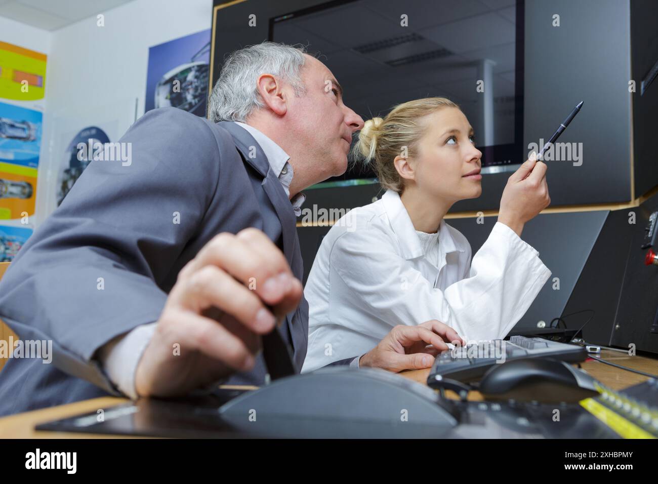 Teacher pupil talking together hi-res stock photography and images - Alamy