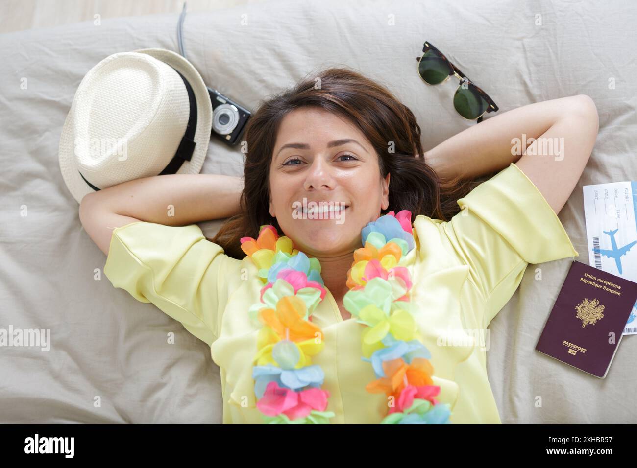 person laying on a bed Stock Photo