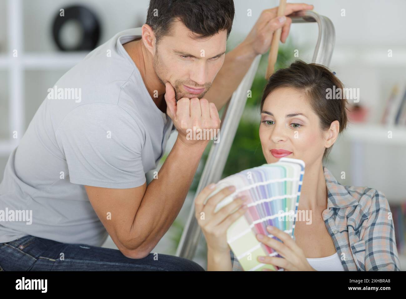 Home makeover couple hi-res stock photography and images - Alamy