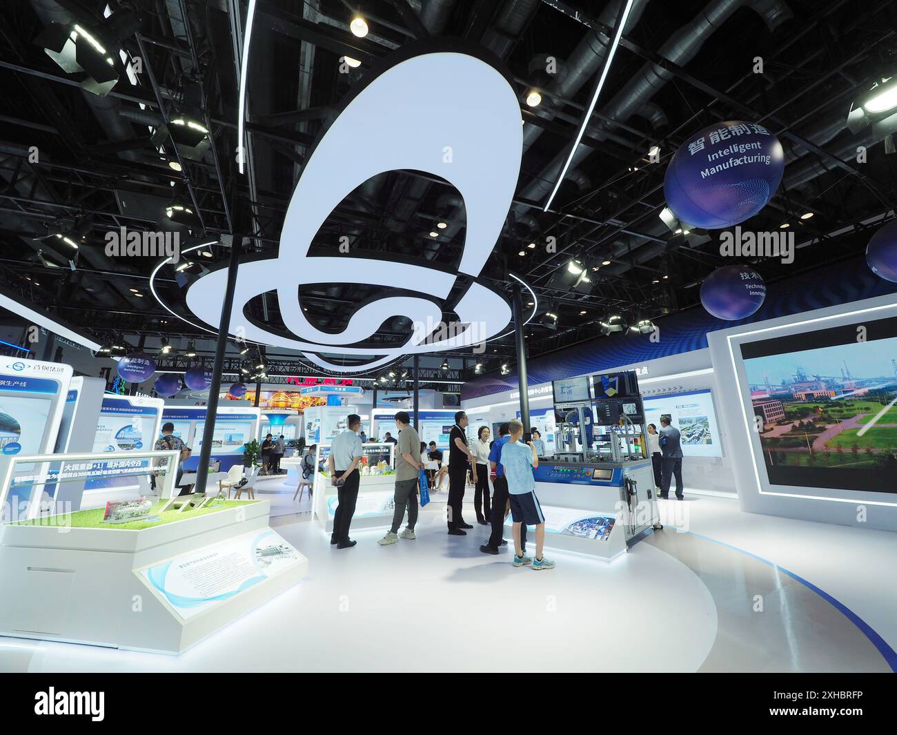 BEIJING, CHINA - JULY 13, 2024 - Visitors view an "industrial robot" at ...