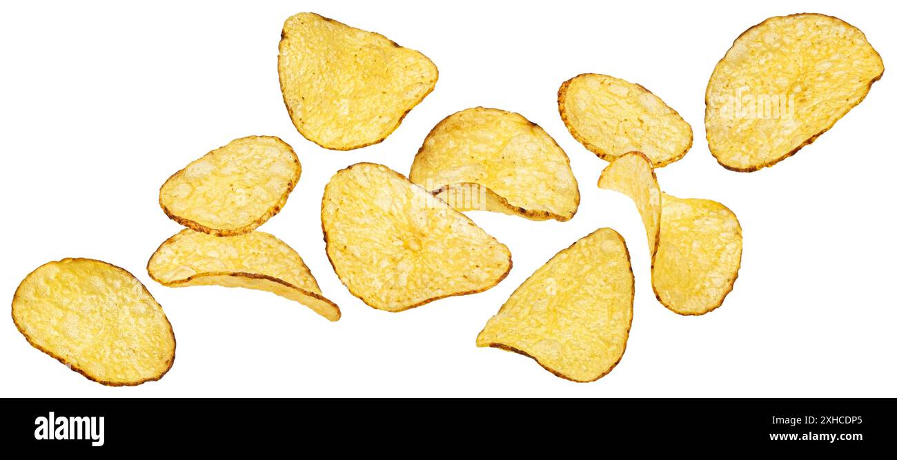 Falling kettle potato chips isolated on white background, full depth of field Stock Photo