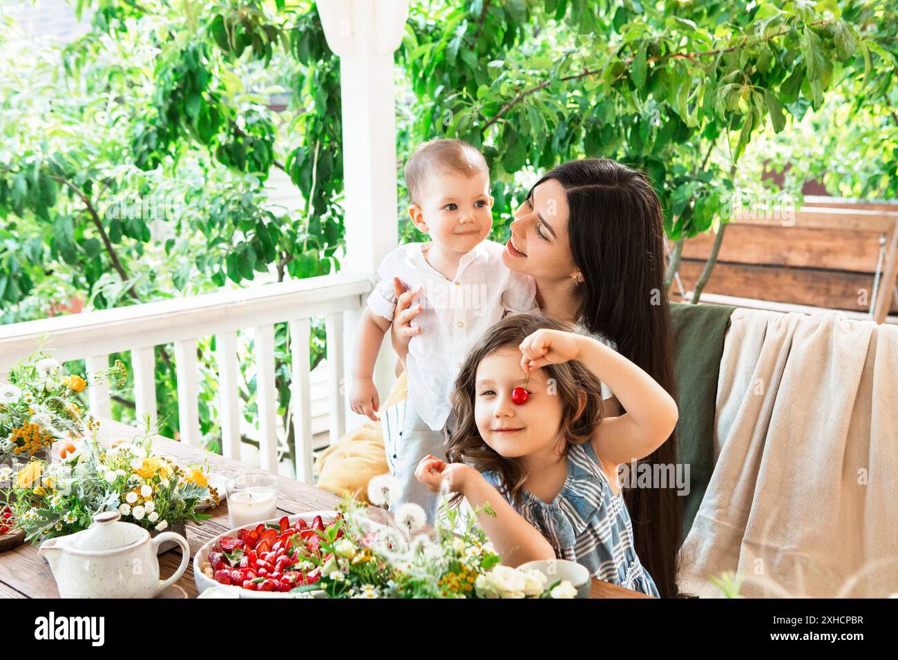 View of breakfast table in backyard Stock Photo - Alamy