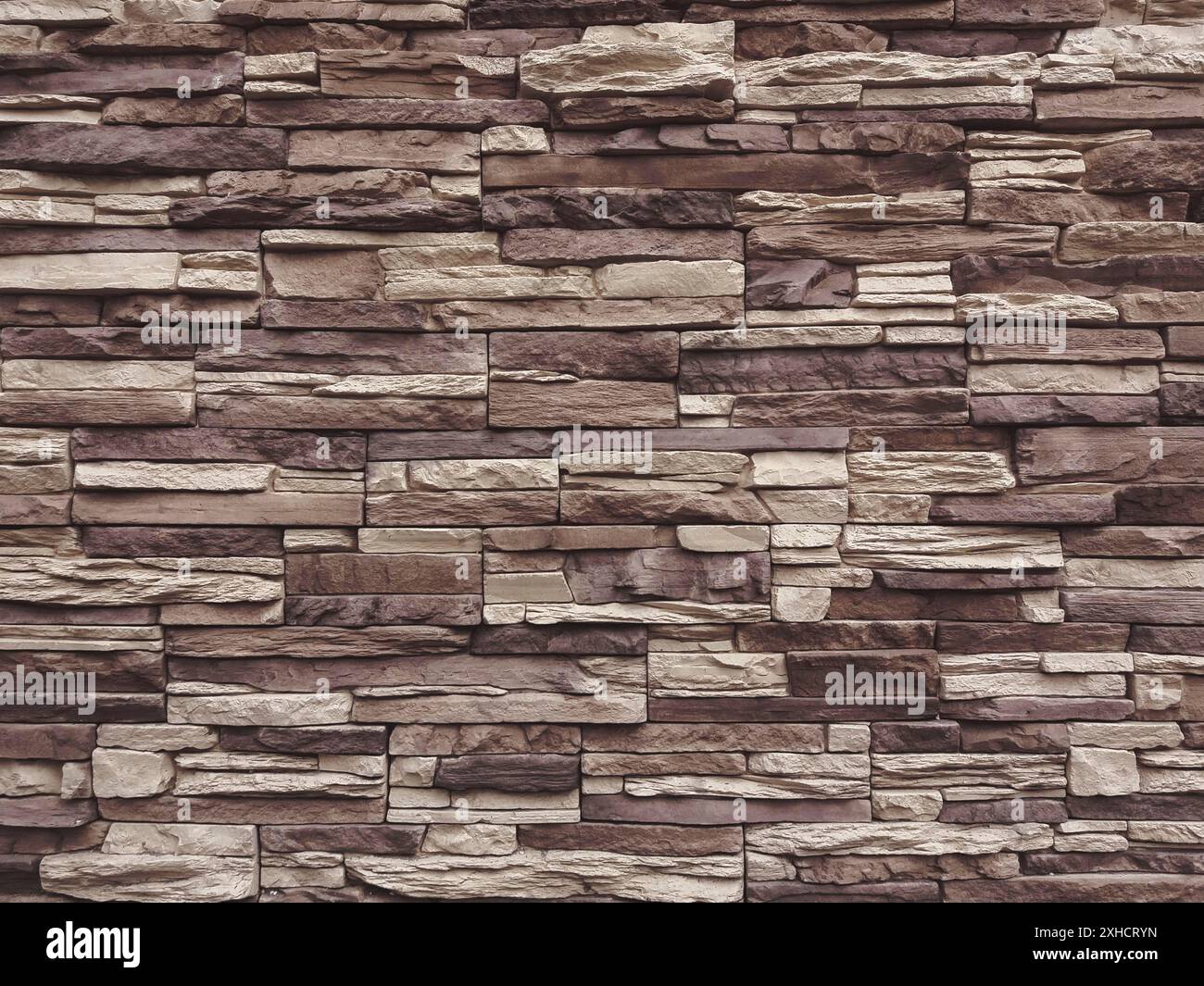 Dark beige and brown slate stone wall texture Stock Photo