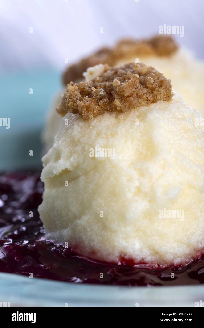 Austrian pot dumplings on plum sauce Stock Photo
