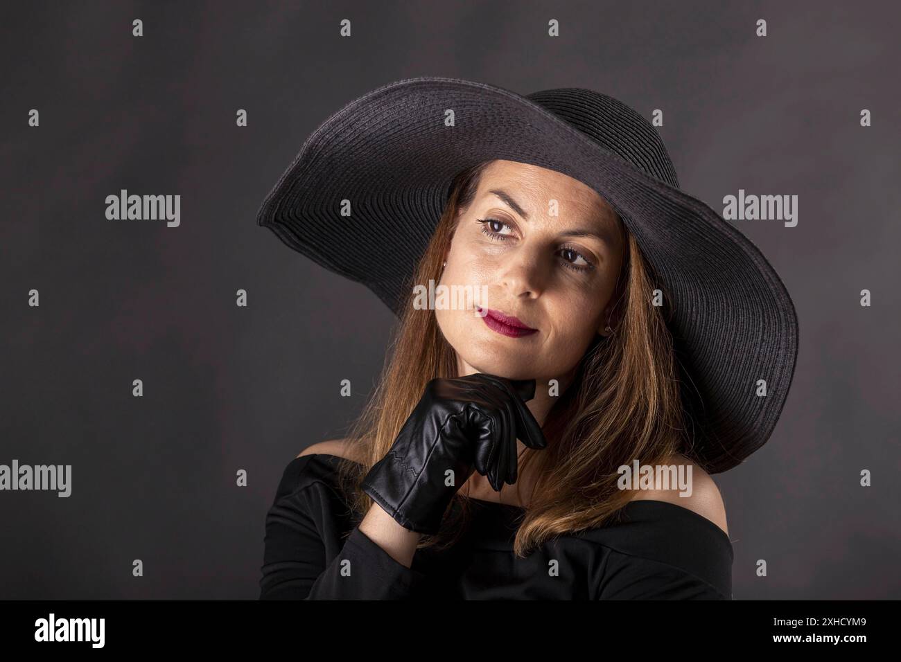 Black hat hi-res stock photography and images - Alamy