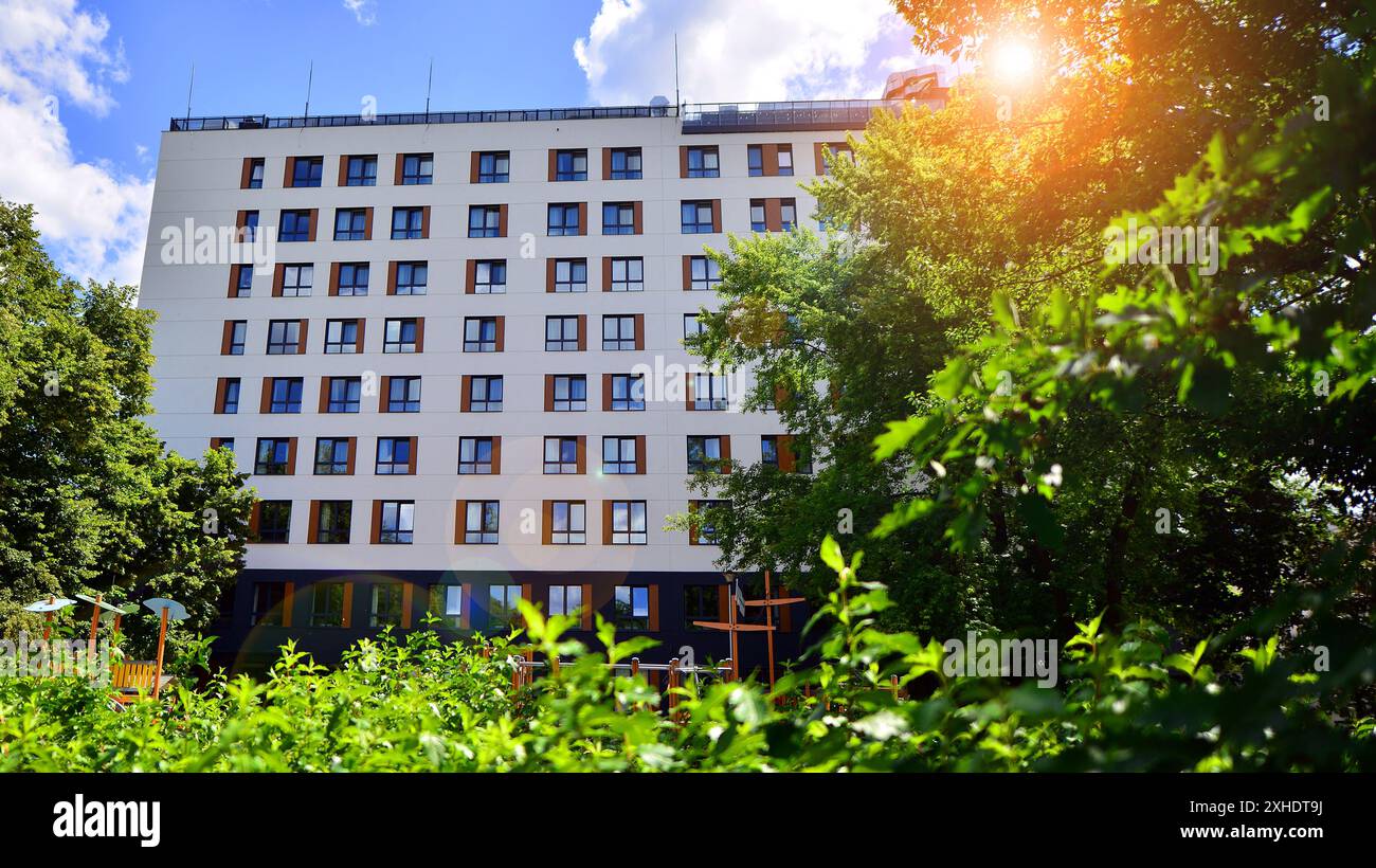 Image showcasing Modern residential building with new apartments in a green residential ...