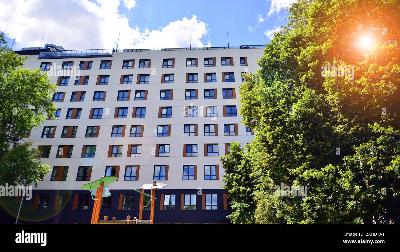 Modern residential building with new apartments in a green residential ...