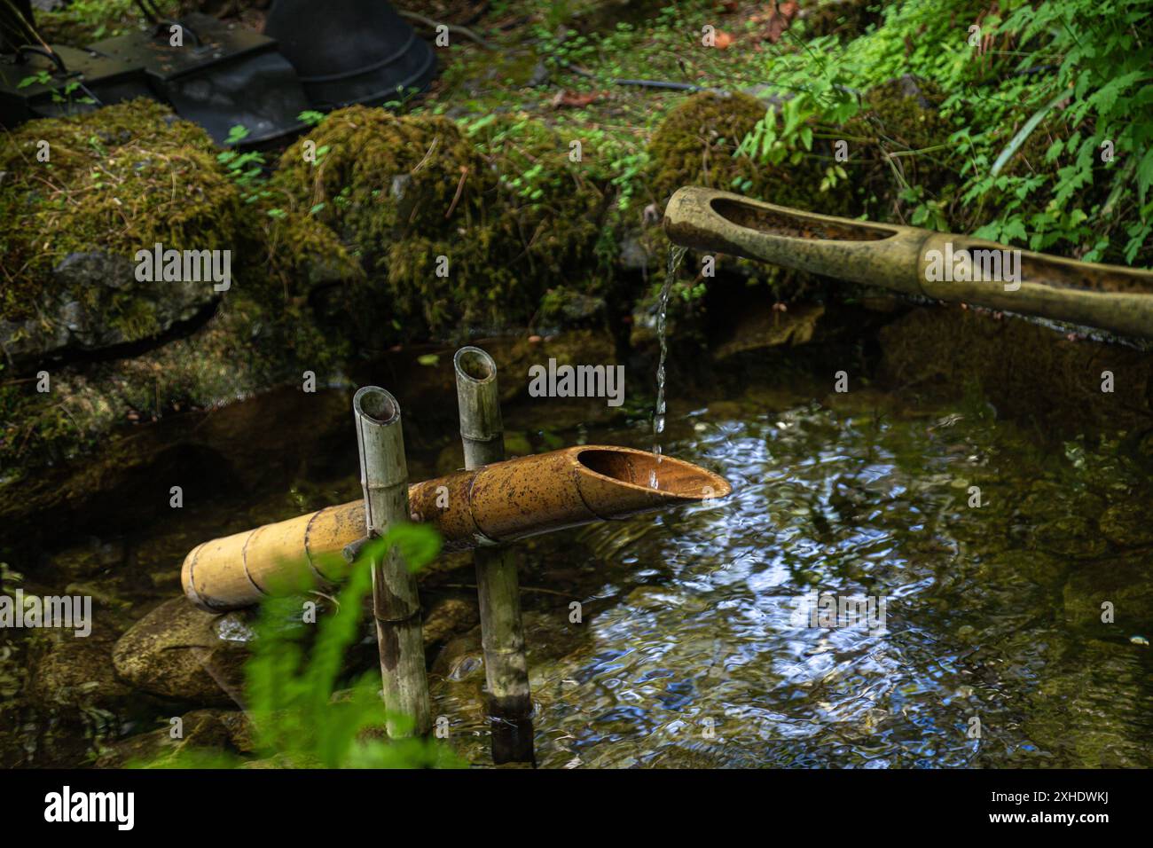 A traditional Japanese ShishiOdoshi 鹿威し) bamboo fountain trickling