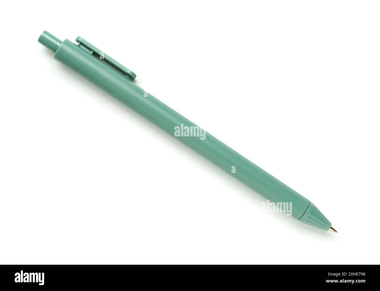Green ballpoint pen on white background Stock Photo