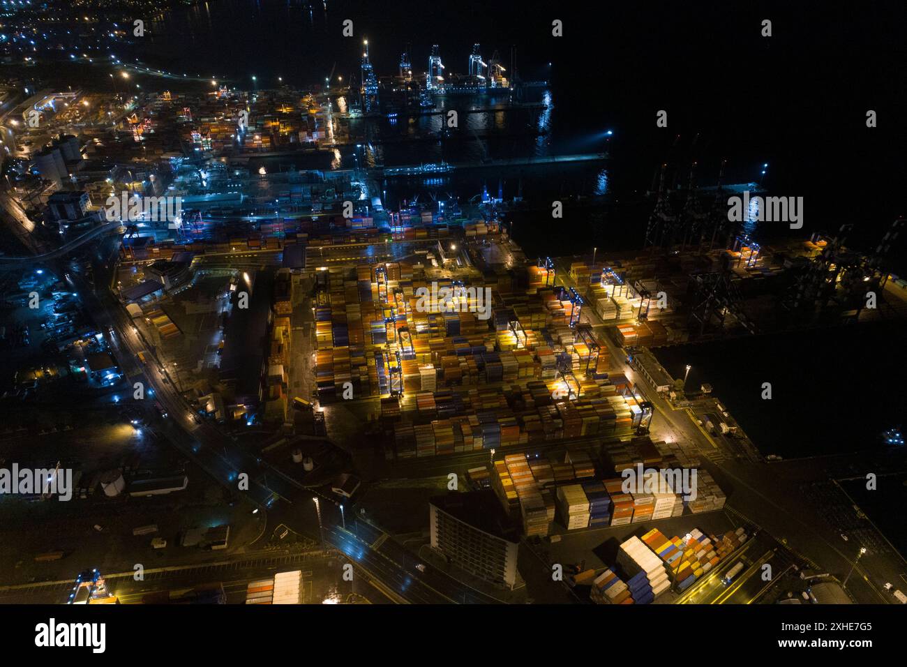 Aerial top view of container ship loading and unloading process ...