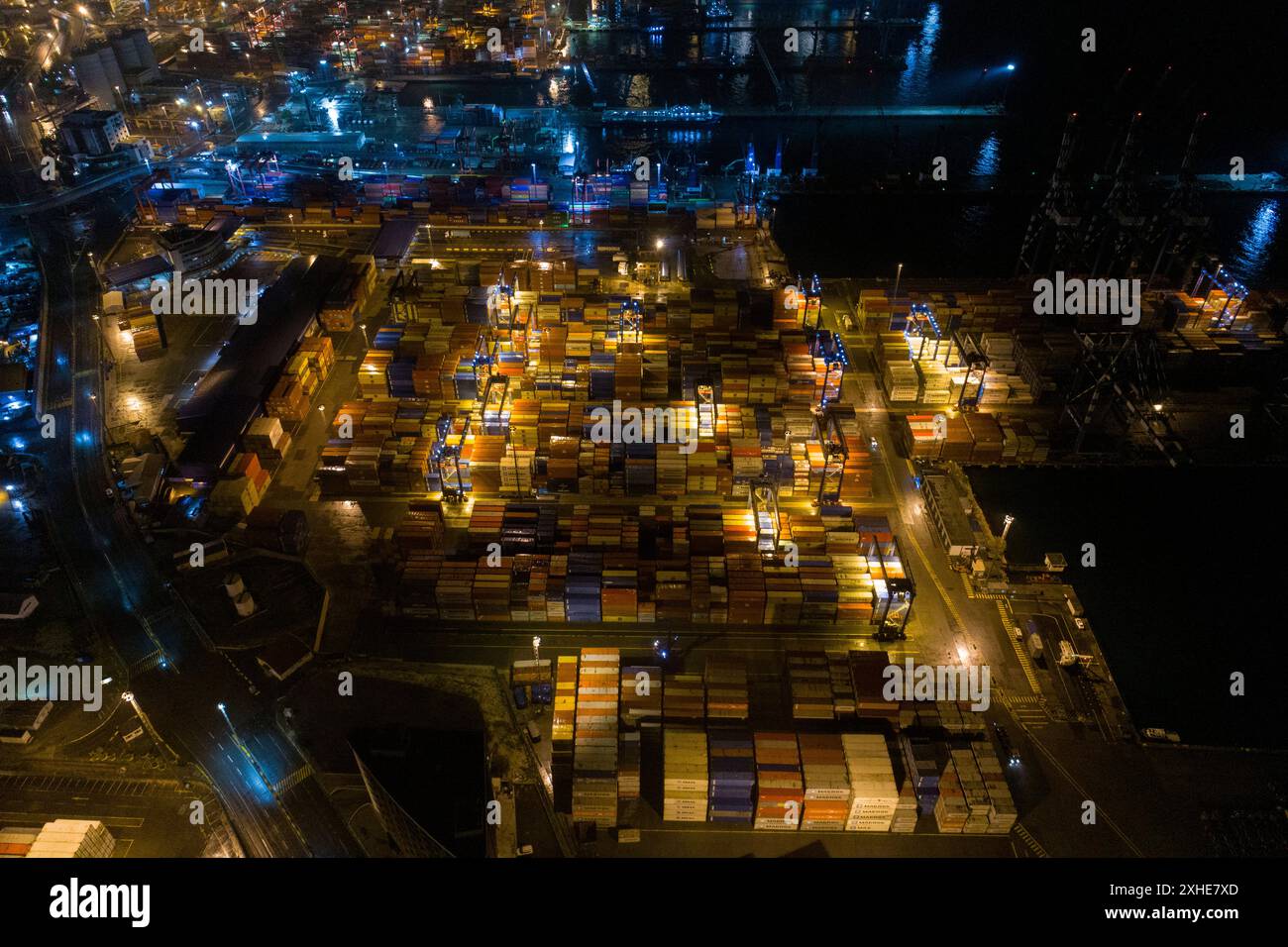 Aerial top view of container ship loading and unloading process ...