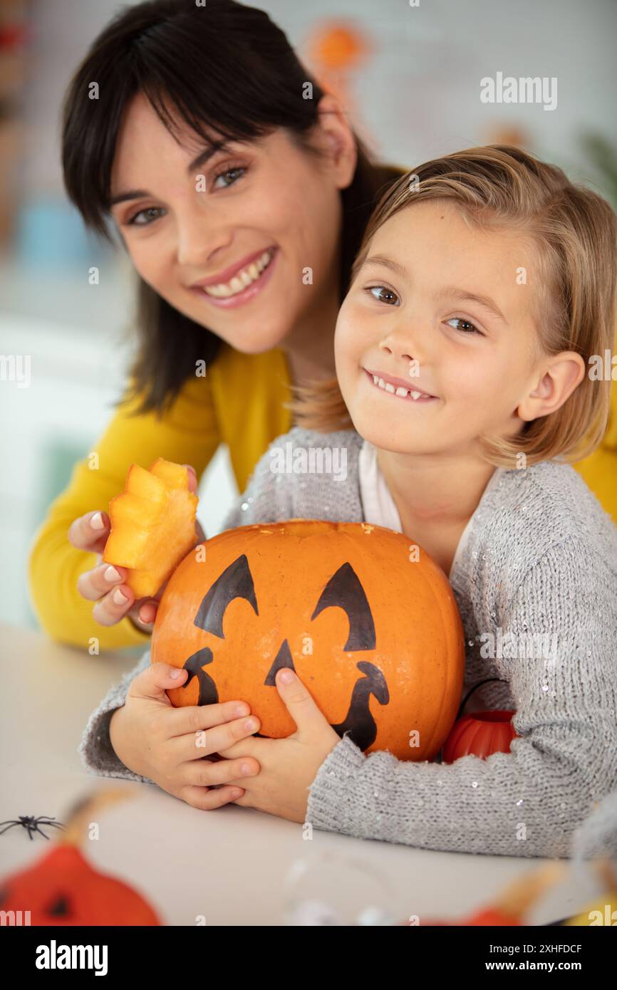 family mother and child daughter getting ready for halloween Stock