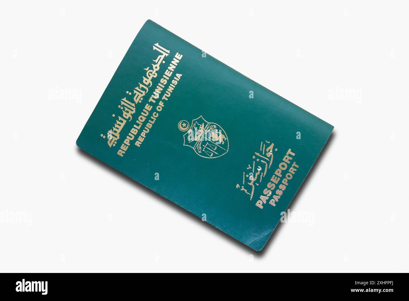 Close-up on a Tunisian passport isolated on a white background. Stock Photo