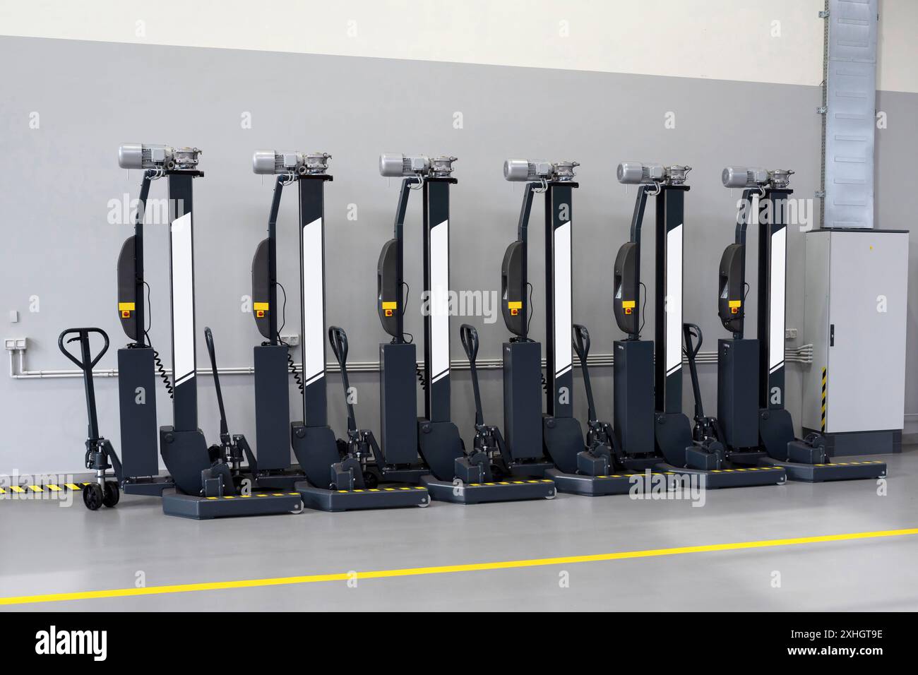 Car lifts for the maintenance of trucks and cars in a car service. Car ...