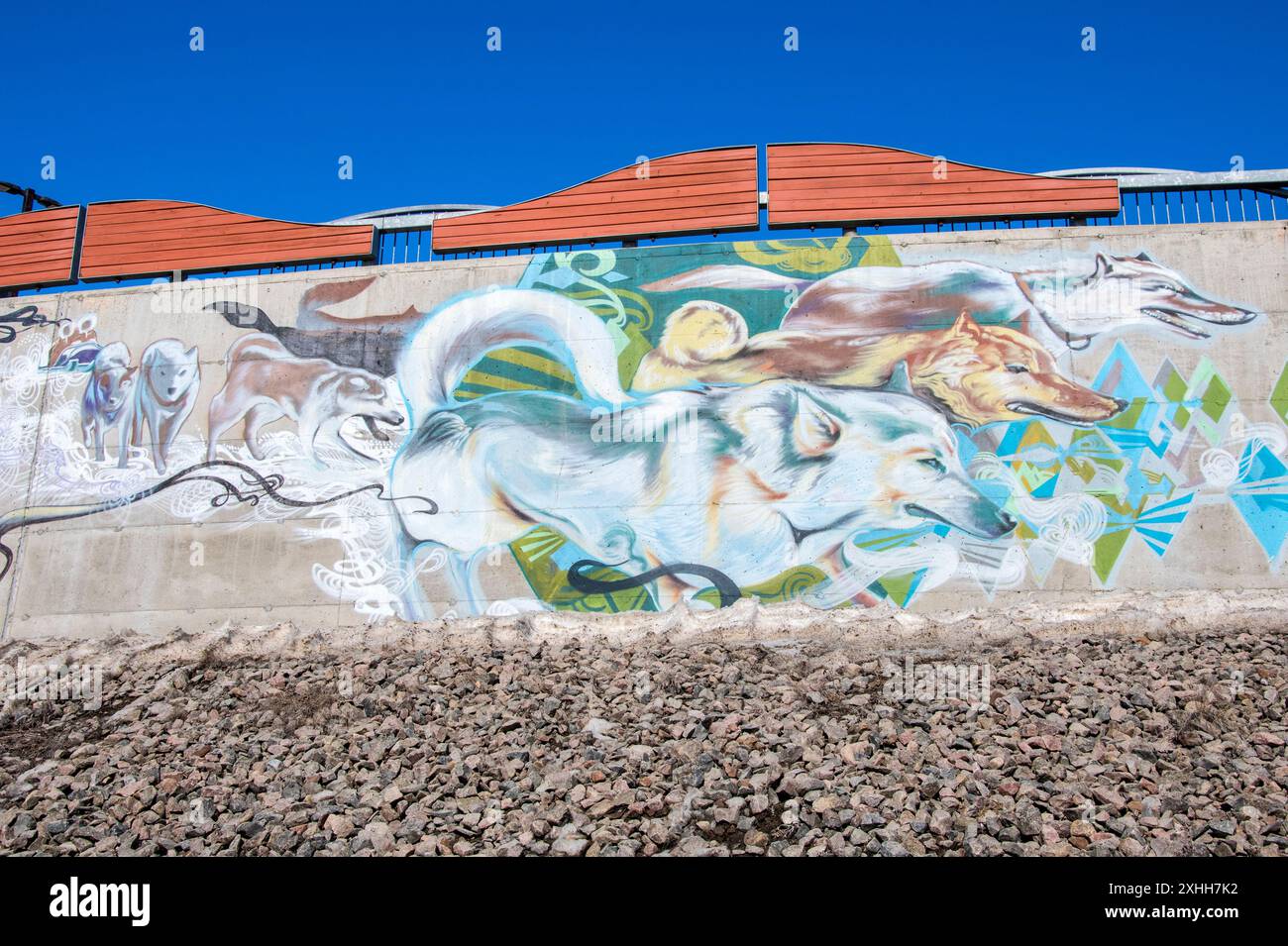Sled dogs mural under the theme of 'Come Together' at Qikiqtani General Hospital in Iqaluit, Nunavut, Canada Stock Photo