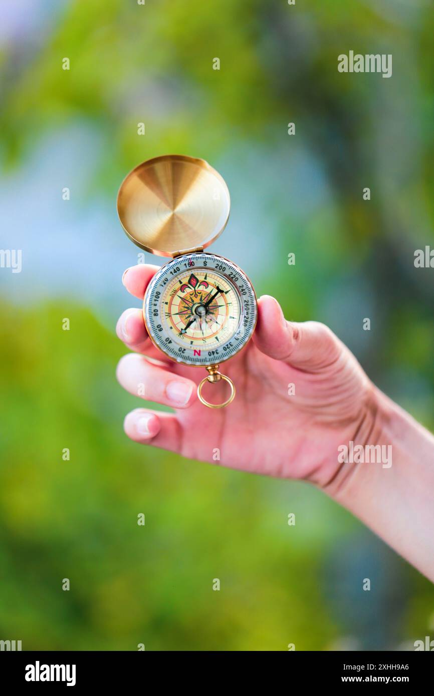Hiker holding compass hi-res stock photography and images - Alamy