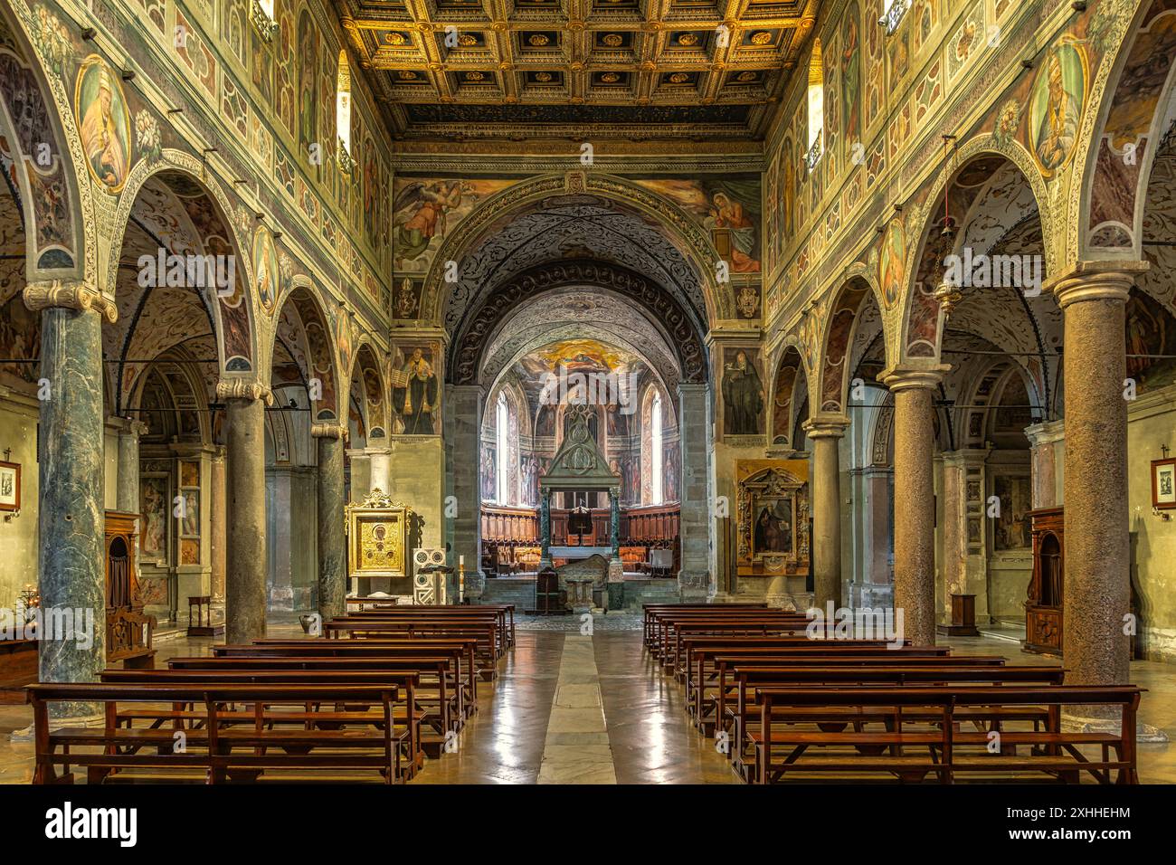 The arches, the baroque frescoes, the presbytery and the ciborium in ...