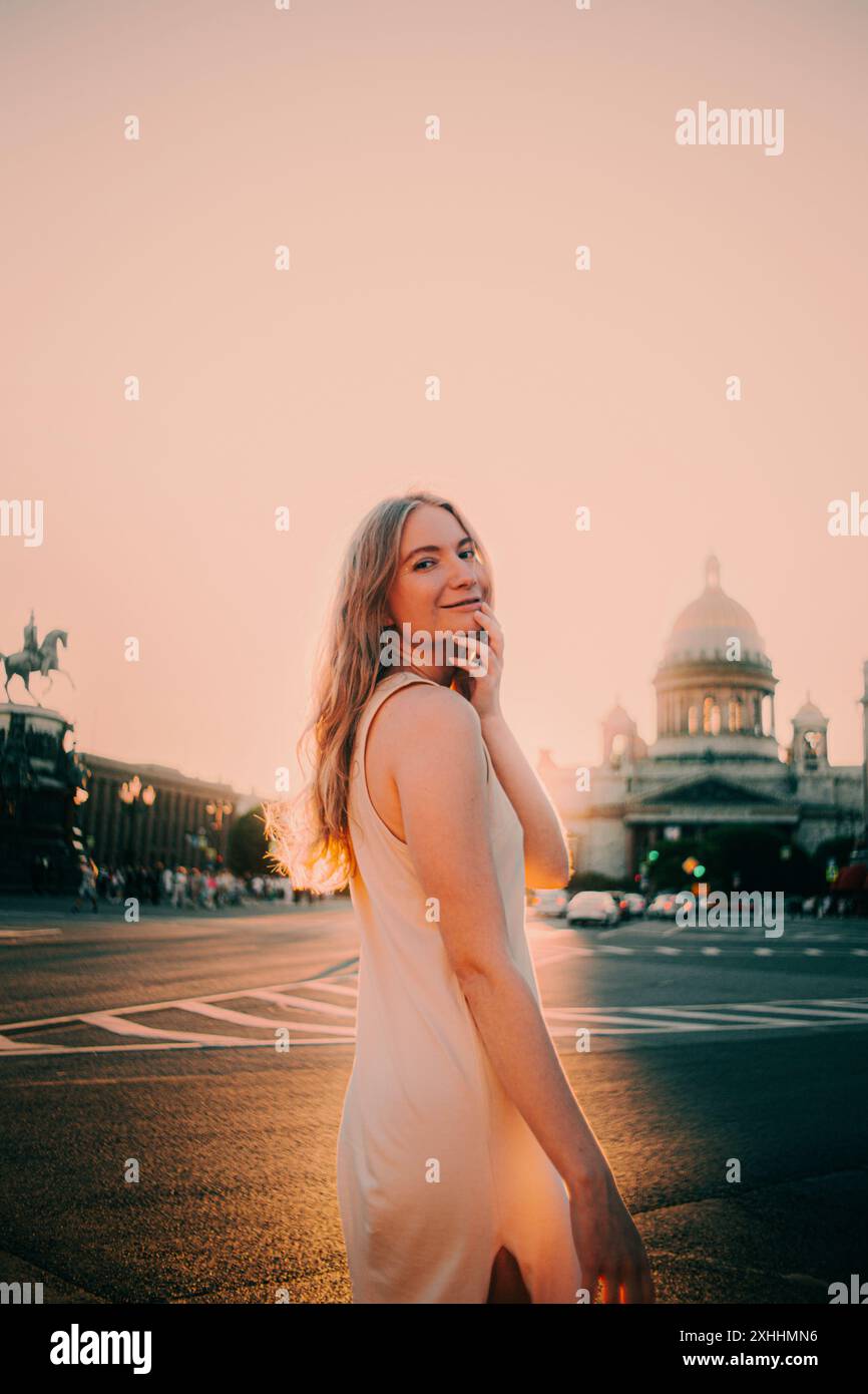 Woman standing against backdrop beam hi-res stock photography and ...