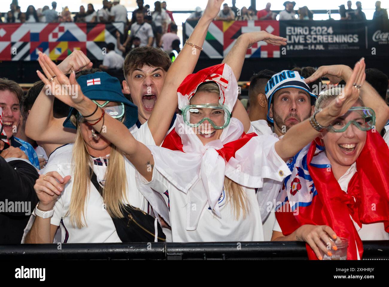 EDITORIAL USE ONLY England fans wear 'Cheer Goggles' by Specsavers ...