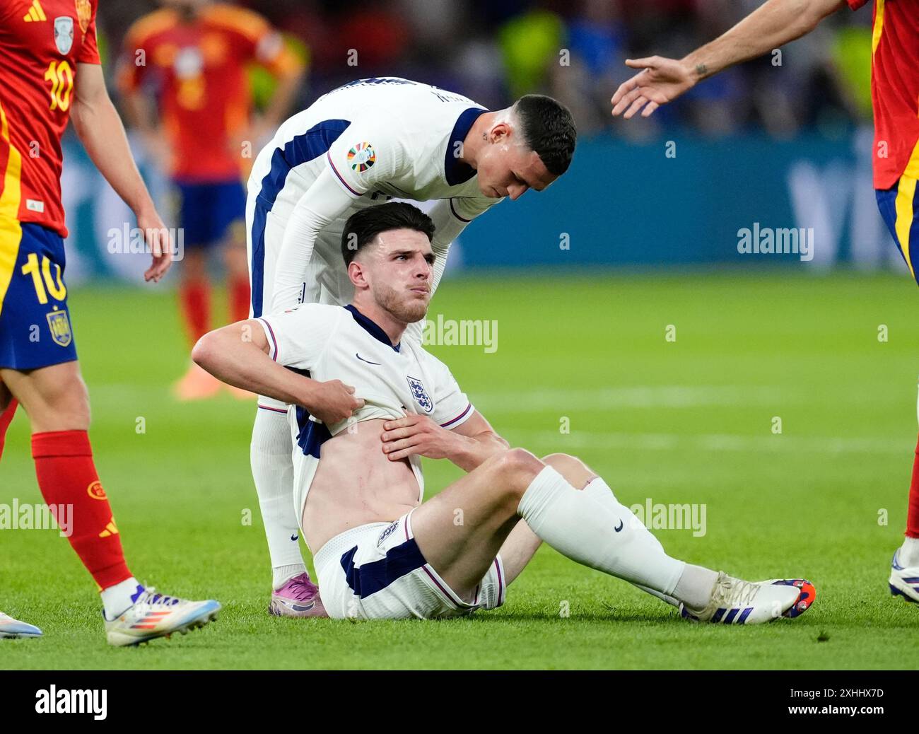 England's Declan Rice reacts after being fouled by Spain's Dani Olmo ...