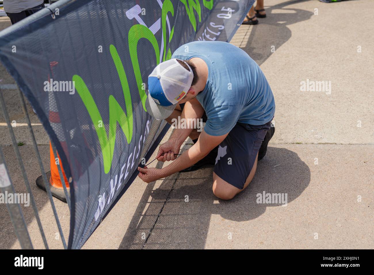 Man in cap blue shirt hi-res stock photography and images - Alamy