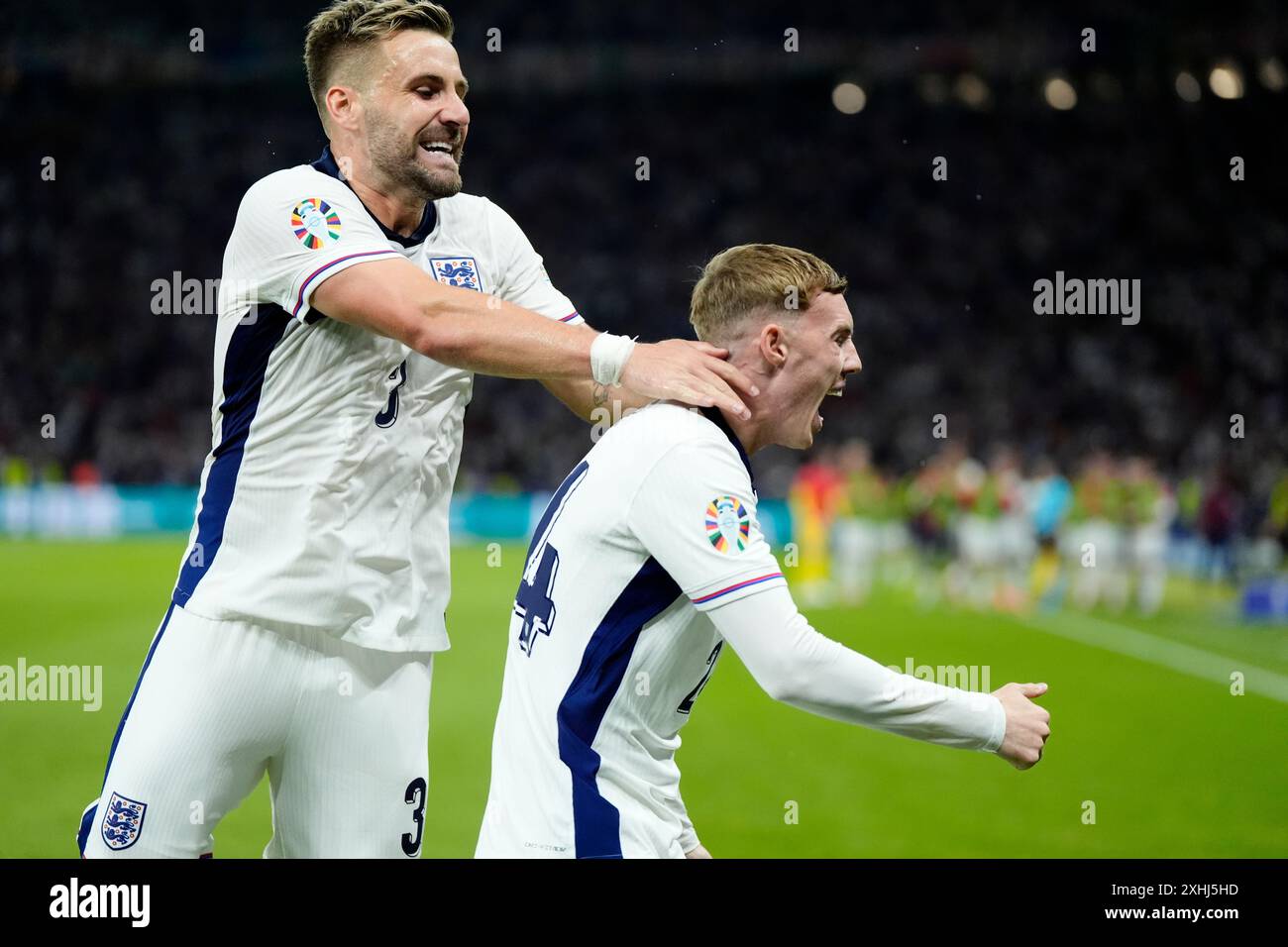 England's Cole Palmer (right) celebrates with Luke Shaw after scoring