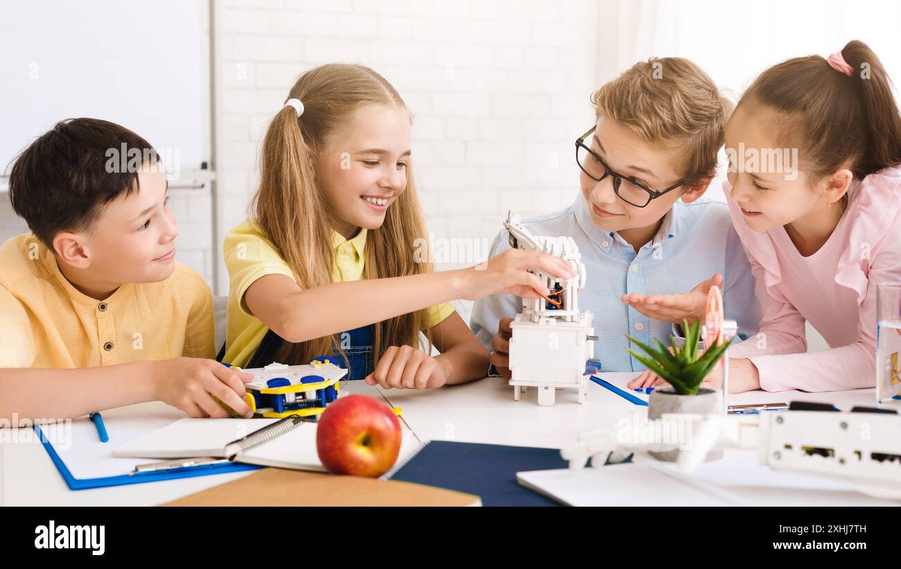 Young Students Collaborate on Robotics Project in Classroom Stock Photo ...