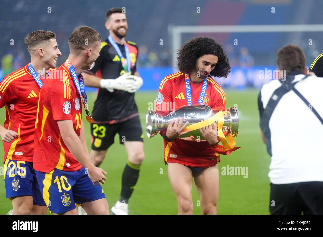Spain s Marc Cucurella Celebrates With The Trophy After Winning The spain-s-marc-cucurella-celebrates-with-the-trophy-after-winning-the