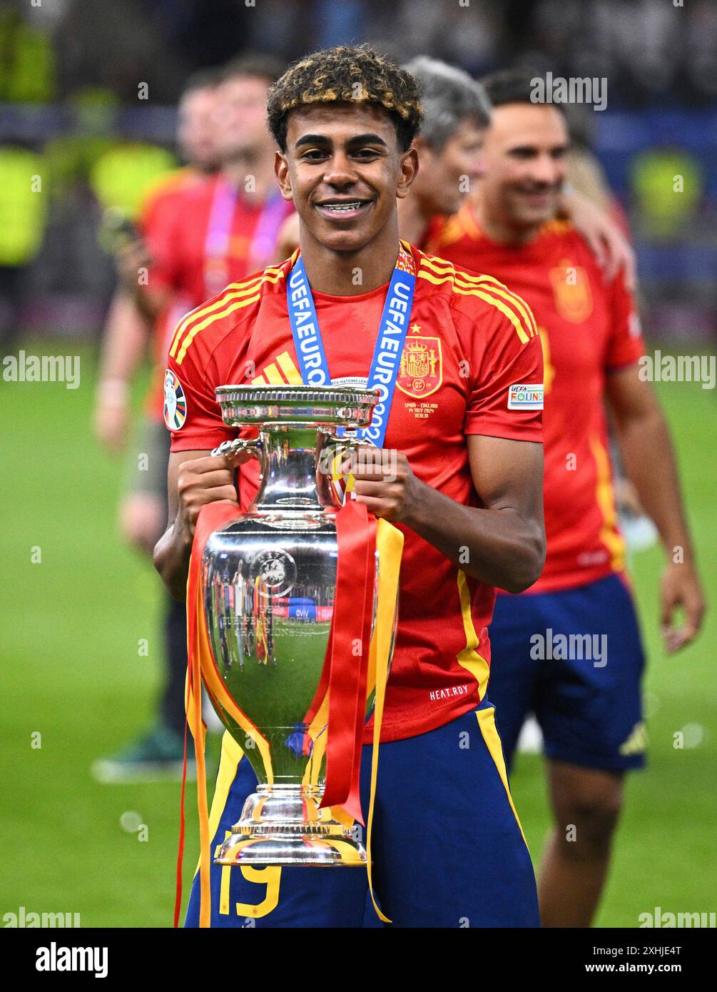 Spain's Lamine Yamal poses with the trophy after the final match