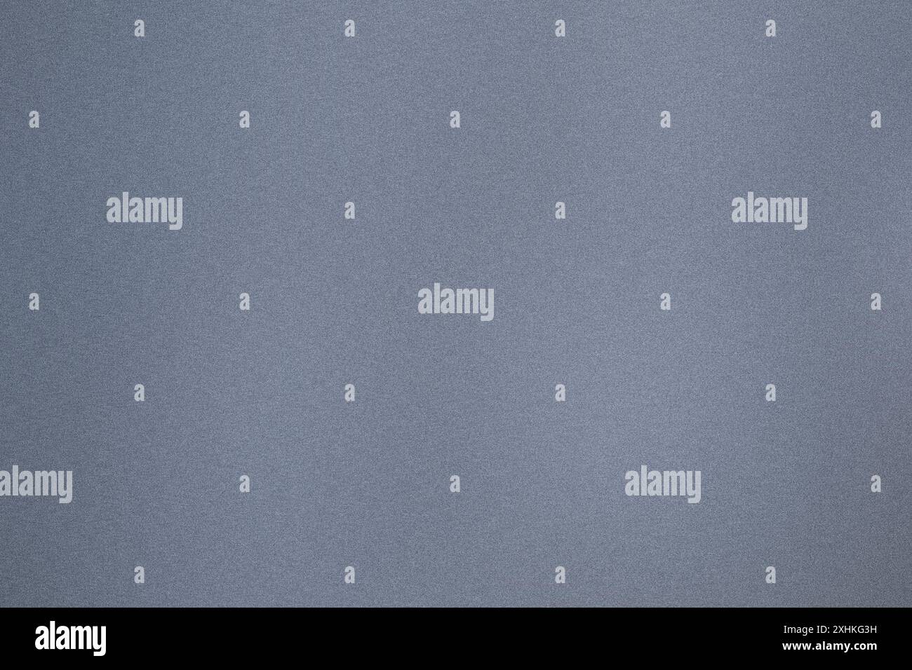 Grainy textured background in shades of gray providing a subtle pattern ...