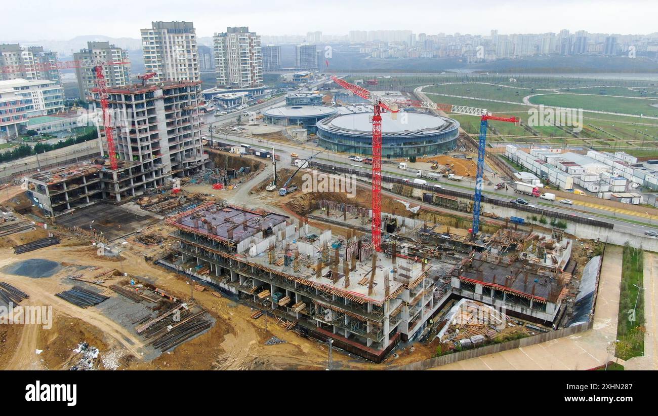Aerial view of construction site with cranes and high rise buildings ...