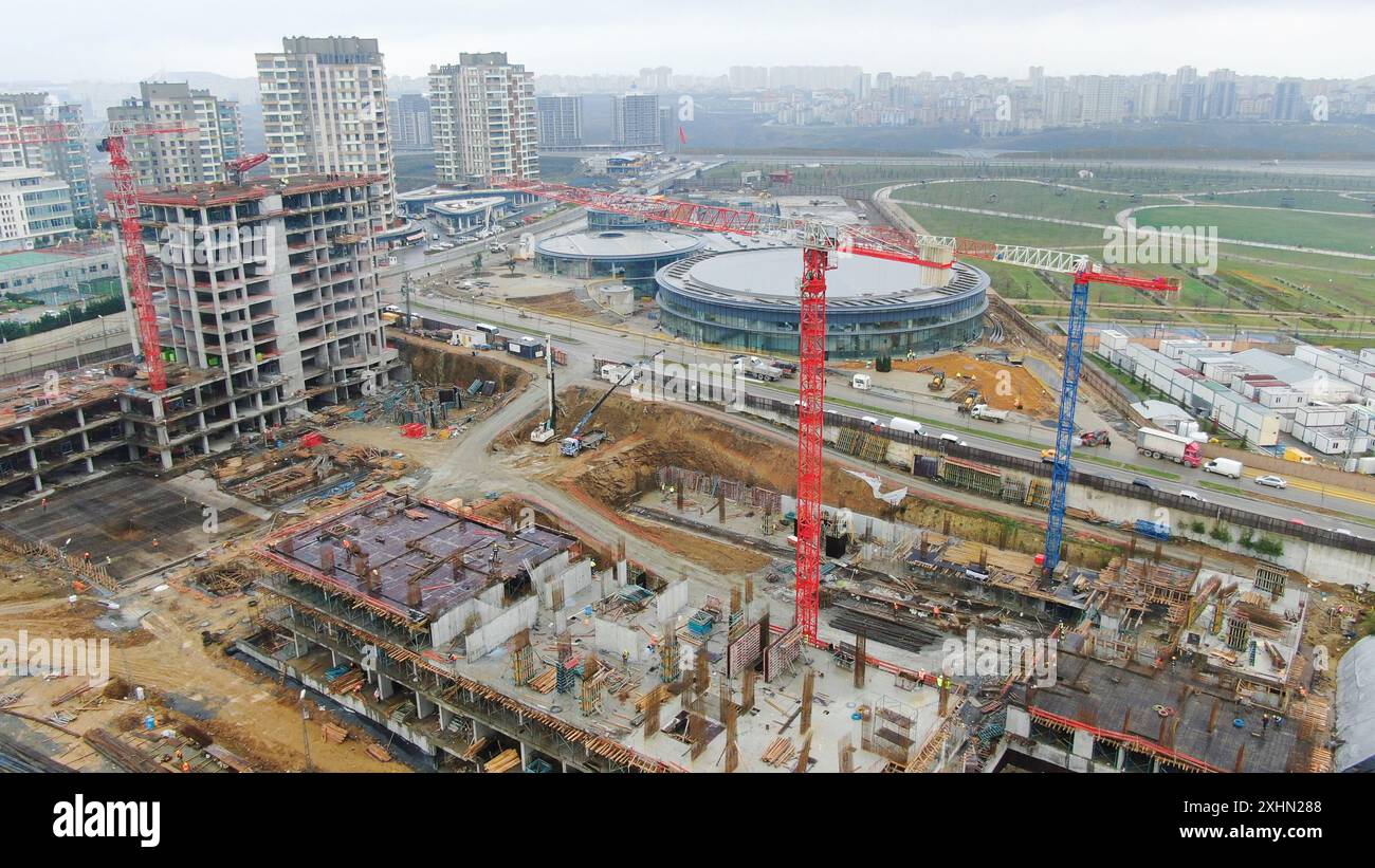 Aerial view of construction site with cranes and high rise buildings ...