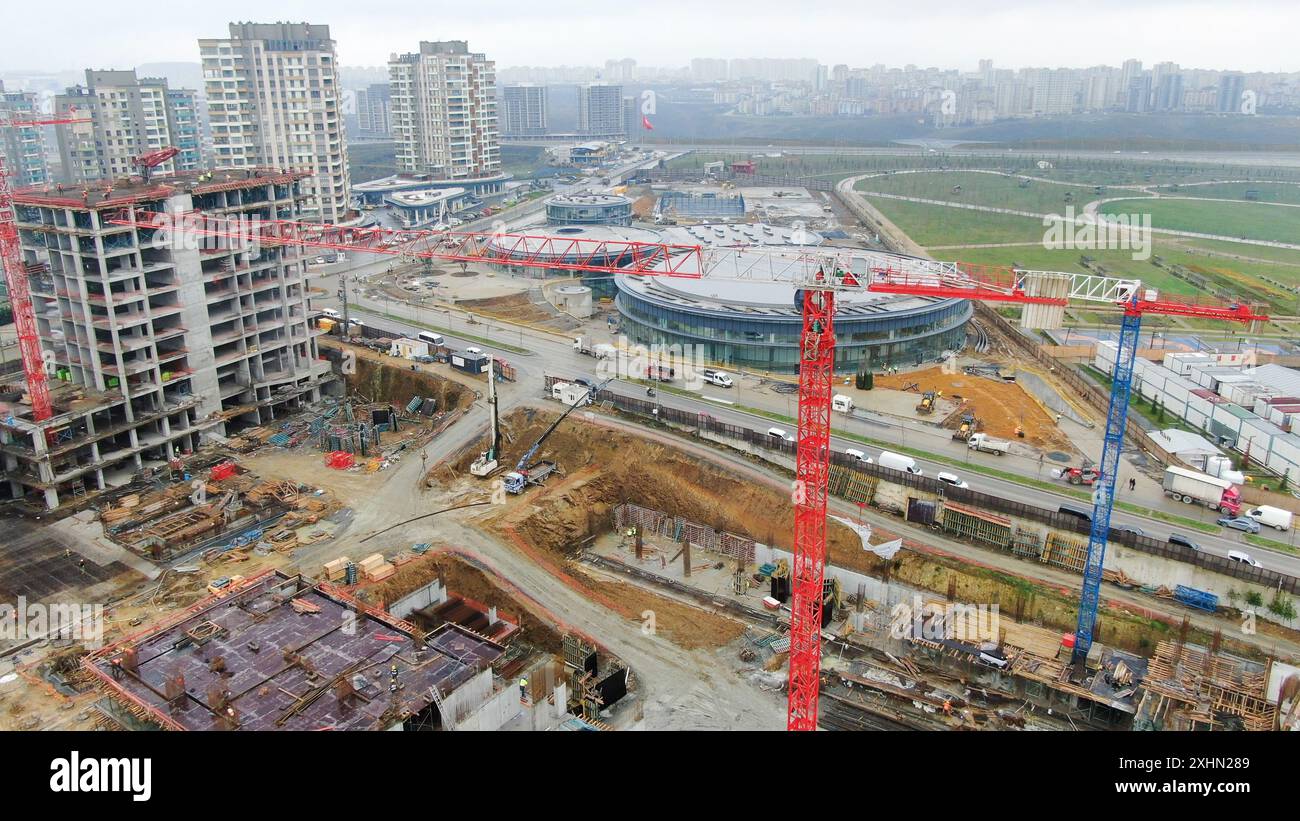 Aerial view of construction site with cranes and high rise buildings ...