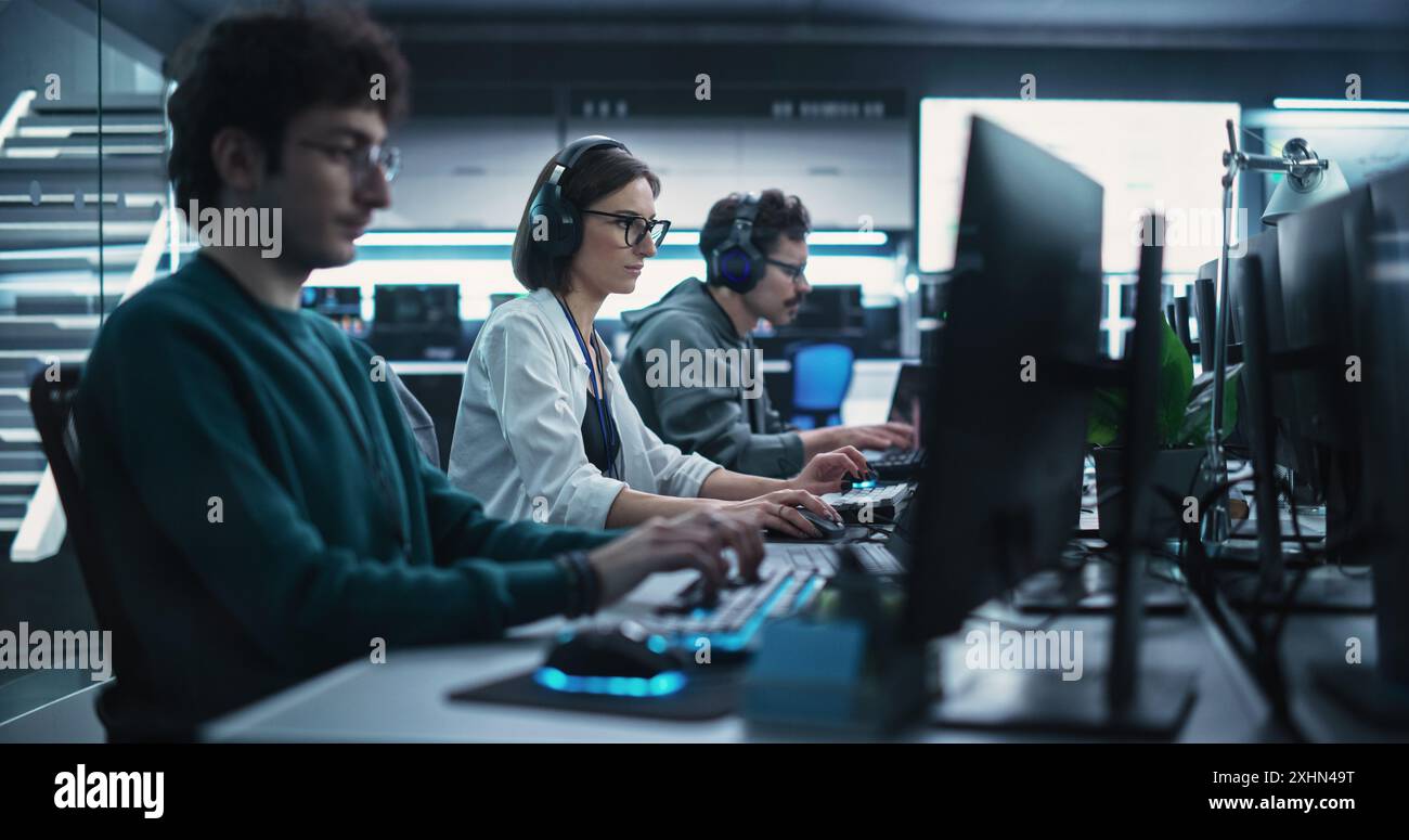 Team of Diverse Multiethnic Software Developers Working on Computers ...