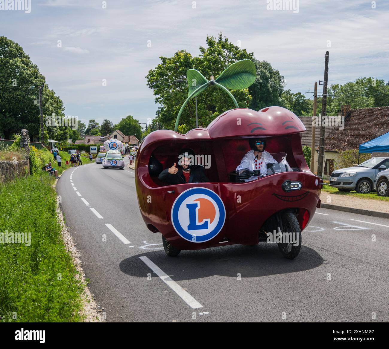 2024 Tour de France race publicity convoy heading through Burgundy. Stock Photo