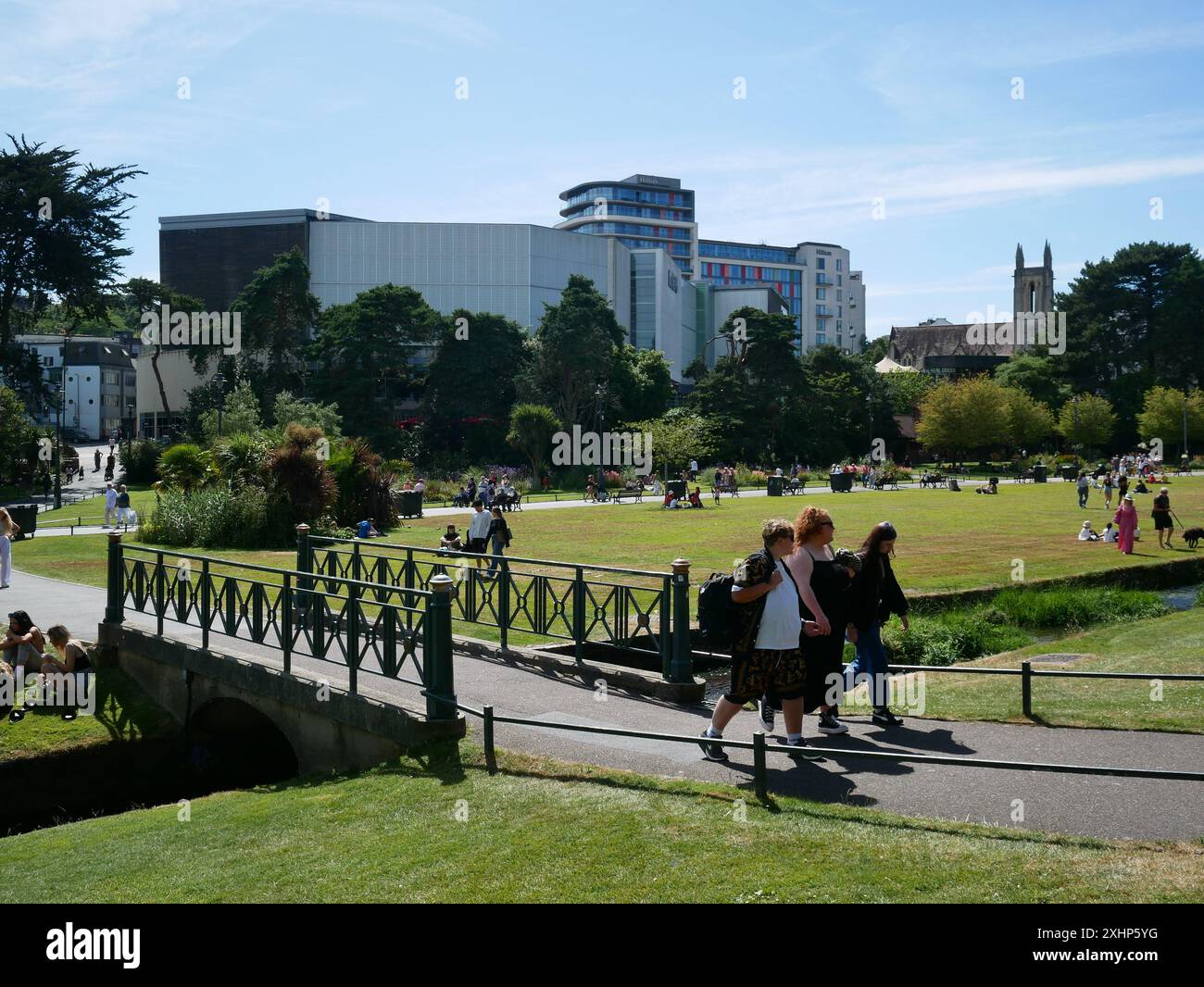 People walking through Lower Gardens in Bournemouth city centre, Bournemouth, Dorset, UK Stock Photo