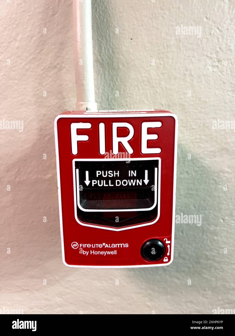 Close-Up of a Fire Alarm Pull Station on a Wall Stock Photo - Alamy