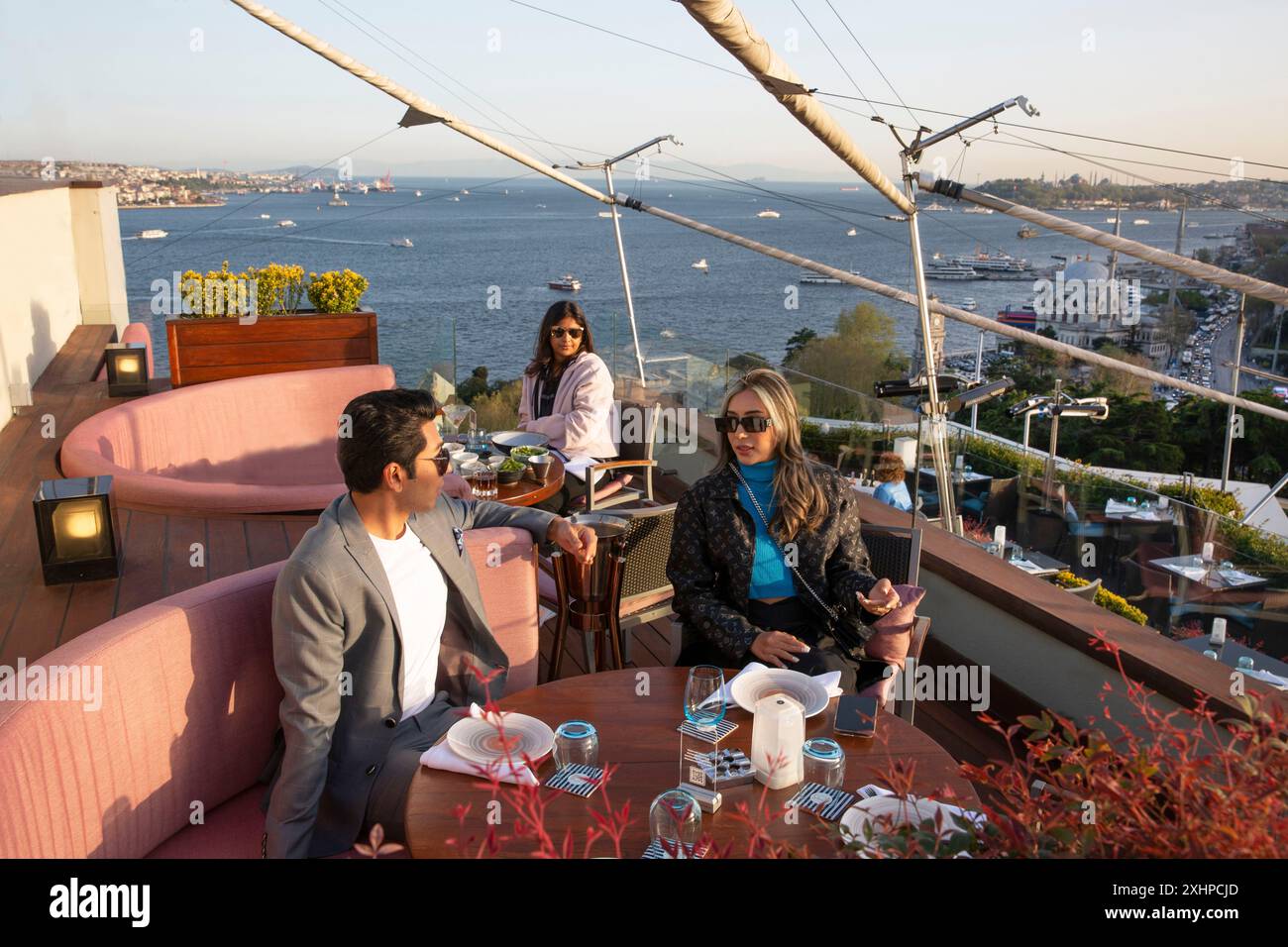 Turkey, Istanbul, Besiktas, young elegant couple at 16 roof, the trendy ...