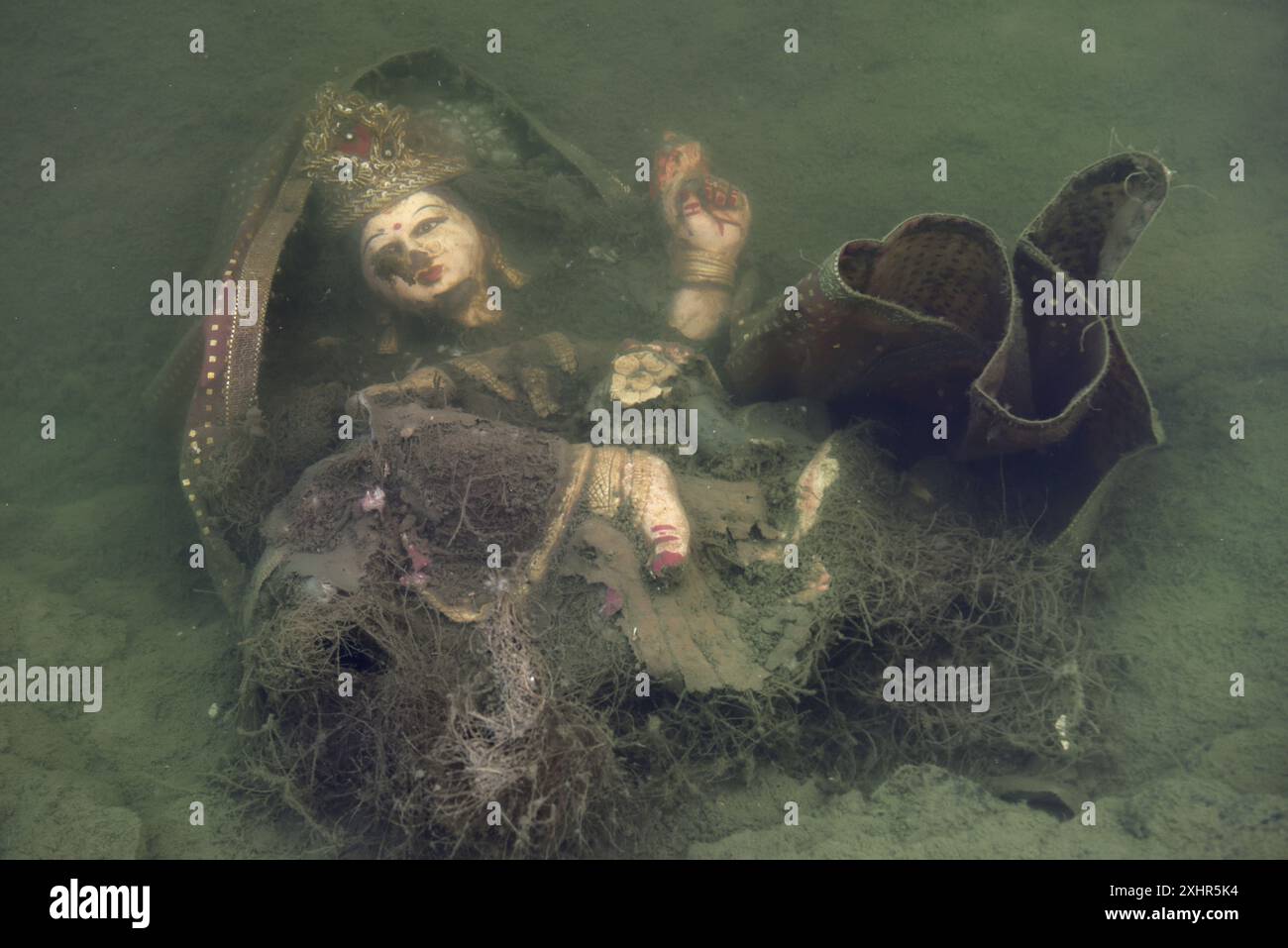 India, Madhya Pradesh, Maheshwar, Durga statue immersed in the Narmada during Durga puja Stock Photo