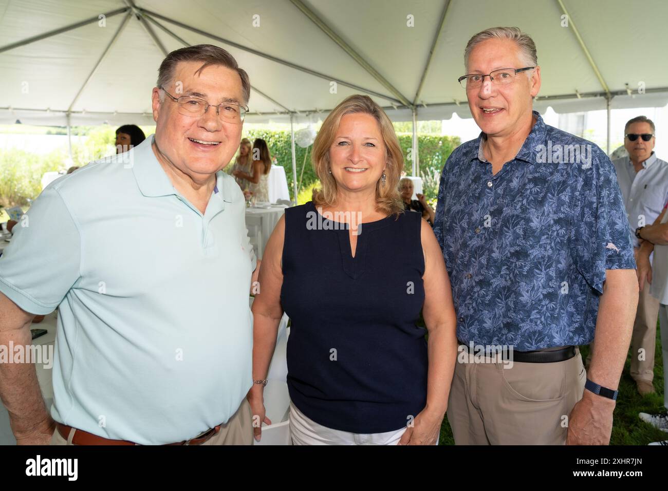 Ed Romaine, Maria Moore and Thomas Moore attends Victoria Schneps and  Geraldo Rivera Summer Soiree for Lifes WORC at Victoria Schneps home in  Quogue, NY on July 14, 2024 (Photo by David