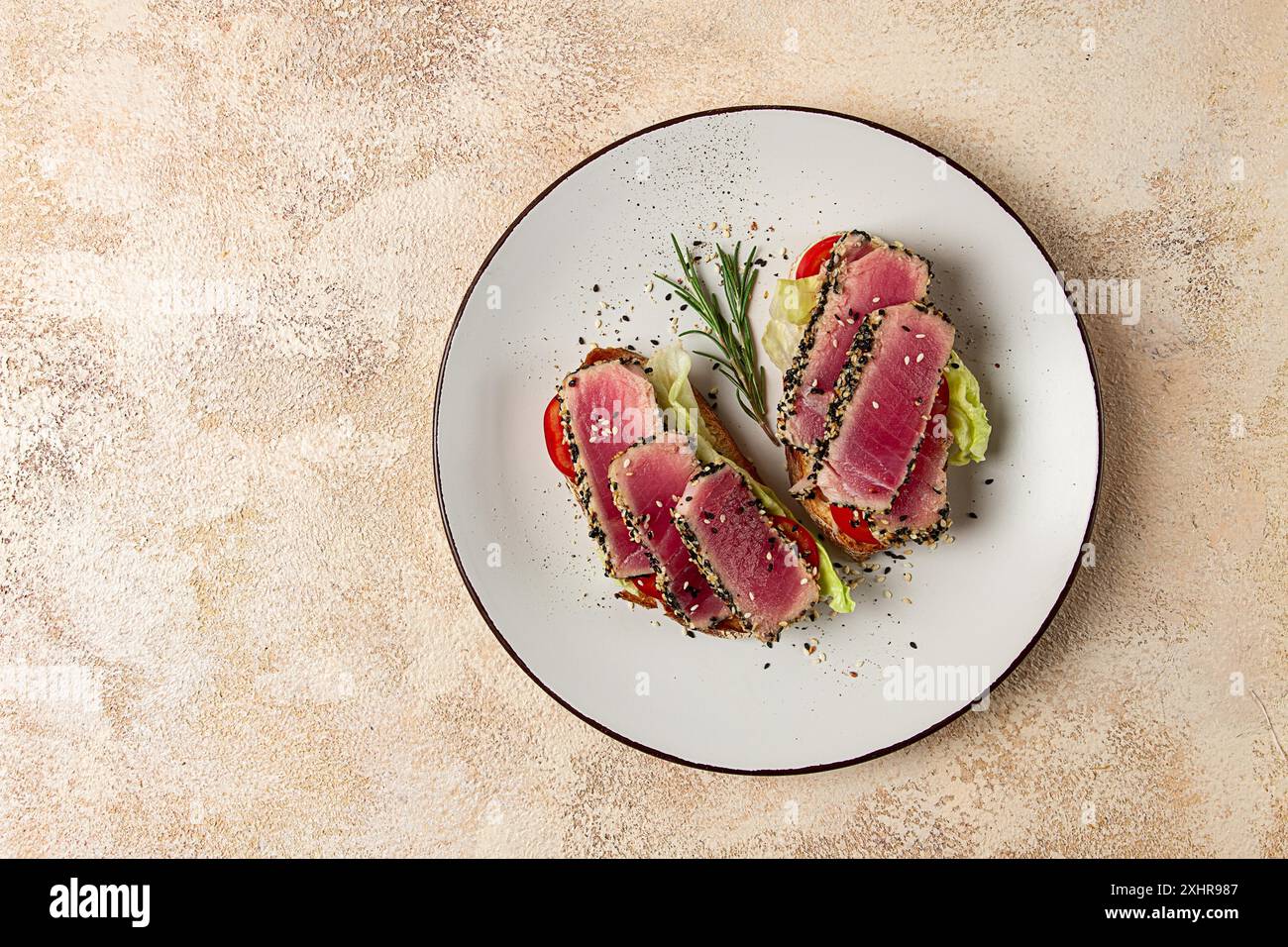 Fillet Breakfast Sandwiches with fried tuna fillet, sesame, breakfast, top view ...