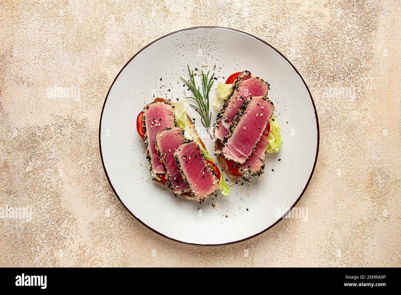 Fillet Breakfast Sandwiches with fried tuna fillet, sesame, breakfast, top view ...