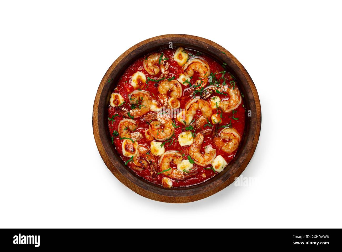 Saganaki with shrimp, in a clay pan, Greek dish, shrimp in tomato sauce ...