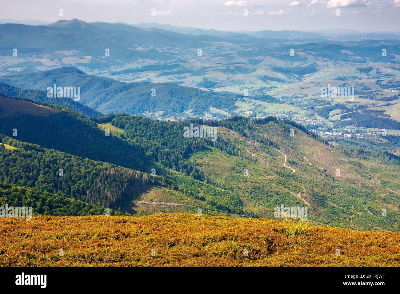 mountainous countryside of transcarpathia view from above. rural valley in the distance. sunny weather in late summer. carpathian mountain of ukraine Stock Photo