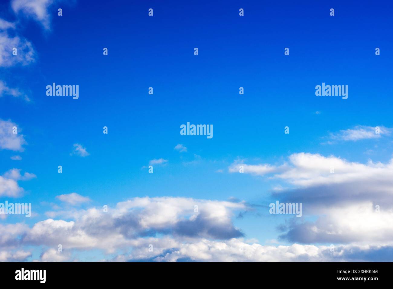 low clouds on the blue sky. good weather forecast. sunny afternoon in winter Stock Photo